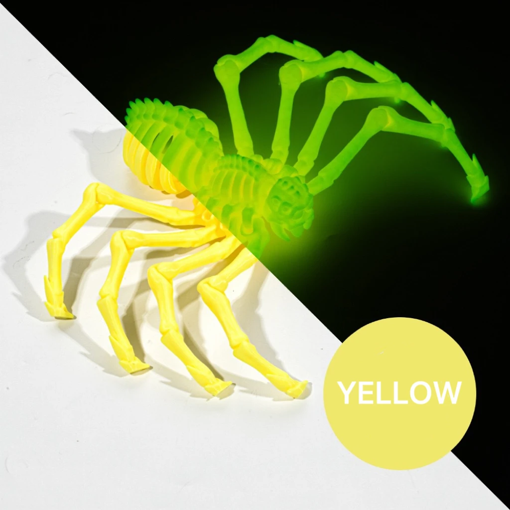 Large spider in yellow, shown in daylight and with a glow effect.